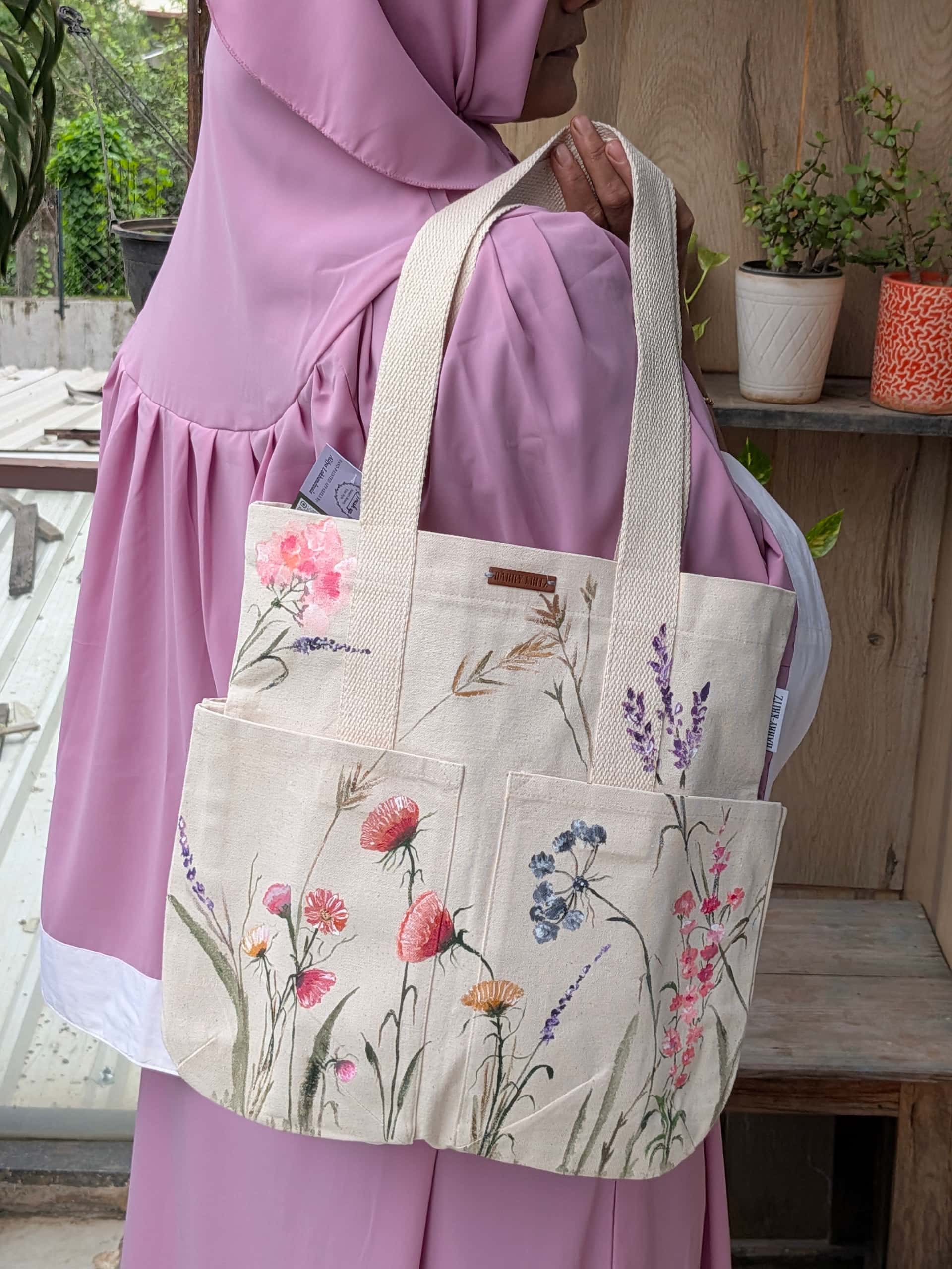 Spring blooms Hand-Painted Canvas Tote Bag — hand-painted artisan piece by Brushup